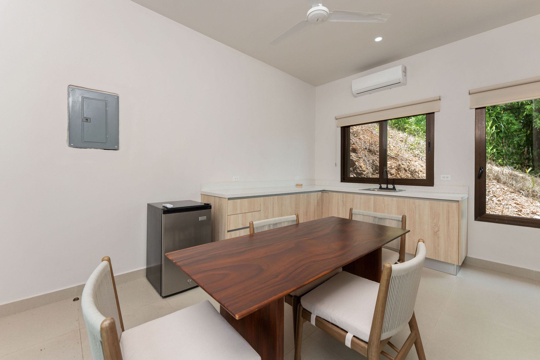 Dining area and kitchenette with table seating